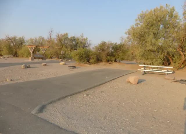 Furnace Creek Campground standard nonelectric site #40 with picnic table and fire ring.