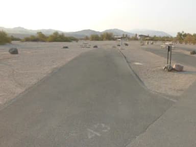 Furnace Creek Campground full hookup site #43. Water, sewer, and 30/50 amp electric connection. One fire pit and one picnic table.