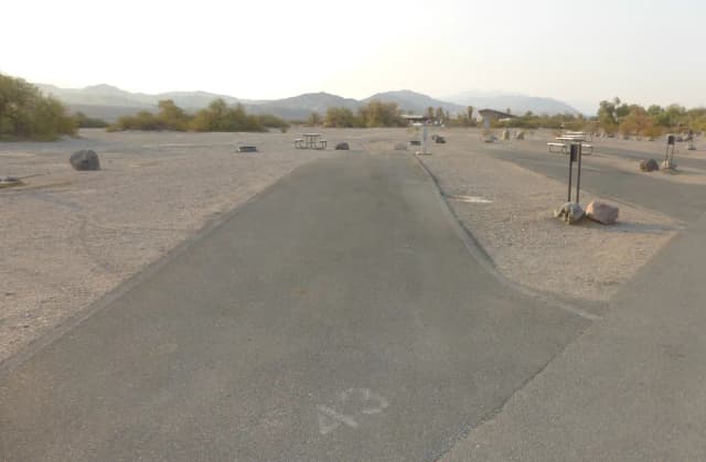 Furnace Creek Campground full hookup site #43. Water, sewer, and 30/50 amp electric connection. One fire pit and one picnic table.