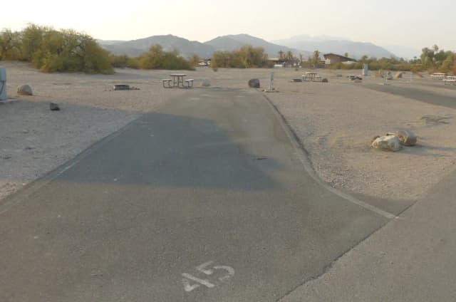 Furnace Creek Campground full hookup site #45. Water, sewer, and 30/50 amp electric connection. One fire pit and one picnic table.