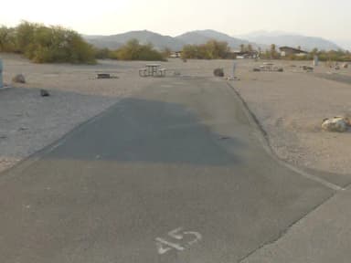 Furnace Creek Campground full hookup site #45. Water, sewer, and 30/50 amp electric connection. One fire pit and one picnic table.