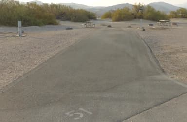 Furnace Creek Campground full hookup site #51. Water, sewer, and 30/50 amp electric connection. One fire pit and one picnic table.