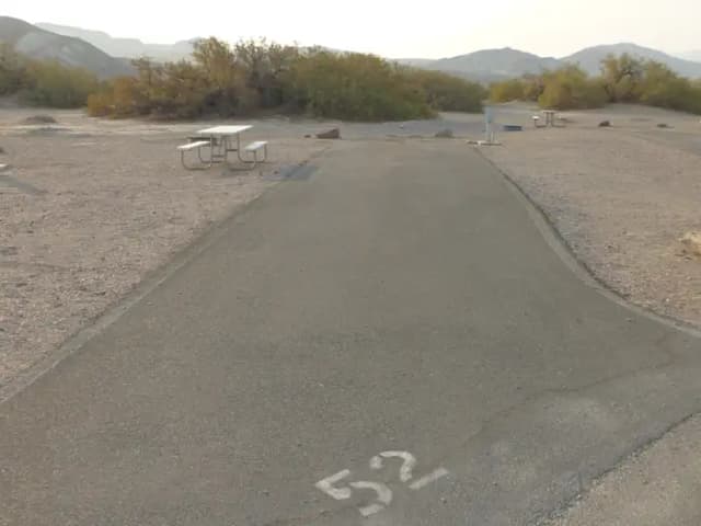 Furnace Creek Campground full hookup site #52. Water, sewer, and 30/50 amp electric connection. One fire pit and one picnic table.
