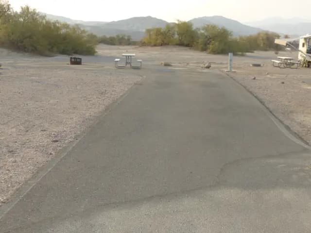 Furnace Creek Campground ADA accessable full hookup site #49. Water, sewer, and 30/50 amp electric connection. One ADA accessible fire pit and picnic table.