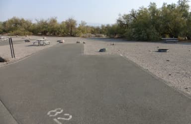 Furnace Creek Campground standard nonelectric site #82 with picnic table and fire ring