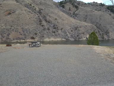 Campsite 01 picnic table, fire pit, on water