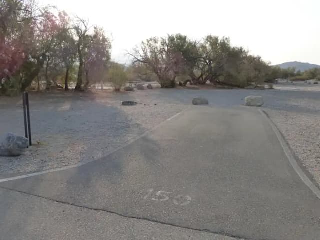 Tent only walk in site #150.  No campervans, RV's, or pop up tents.  One firepit with grate and one picnic table.  No utilities.
