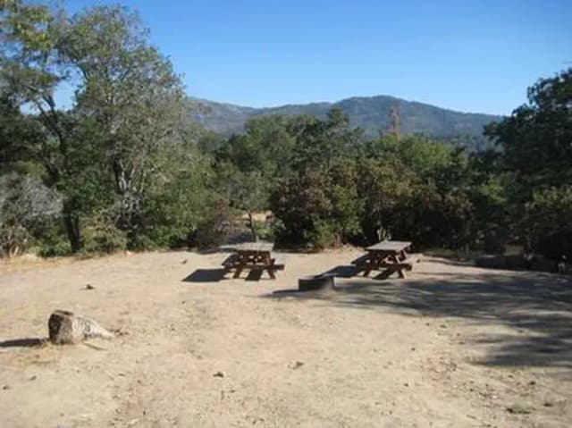 Scenic view of Picnic Tables & Fire Ring at North Shore Campground