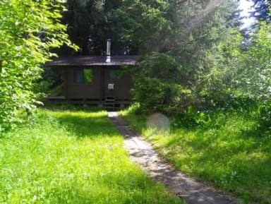 Path through grass leads to Shakes Slough 1 Cabin