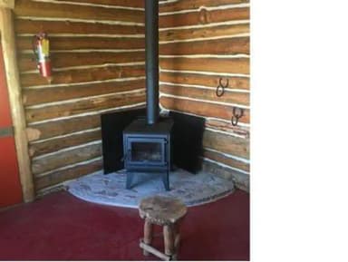 The woodstove inside Priest Rock Cabin