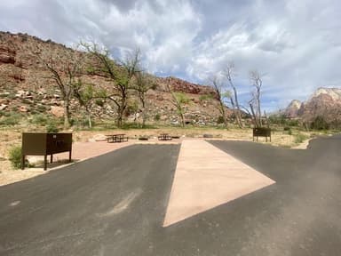 A photo of Site A 19 of Loop A at SOUTH CAMPGROUND (UT) with Picnic Table, Fire Pit, Food Storage, Tent Pad, filed by the agency against 2 campsites at South Campground (UT)